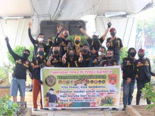 Paguyuban Dewa 86 Bagikan Ribuan Masker di Palembang